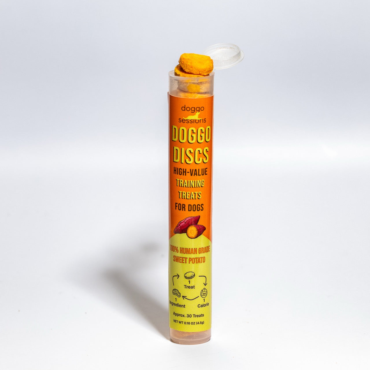 Tube of Doggo Discs high-value Sweet Potato training treats for dogs on a white background