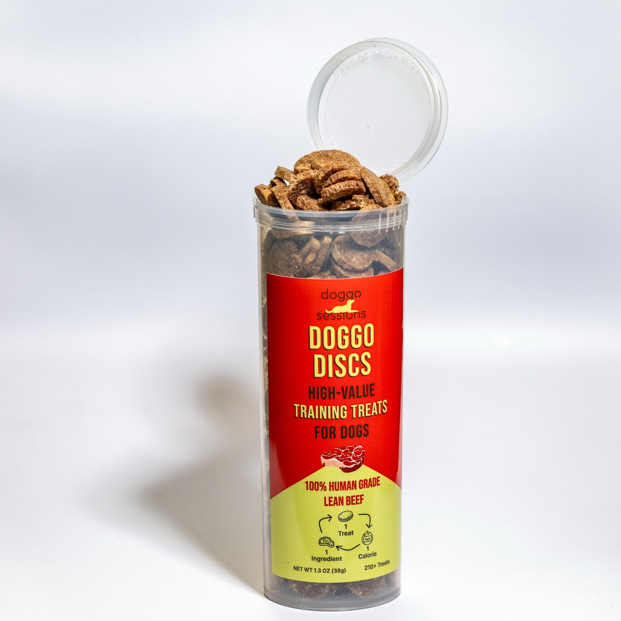 Container of DOGGO DISCS high-value training treats for dogs red and yellow treat barrel on a white background